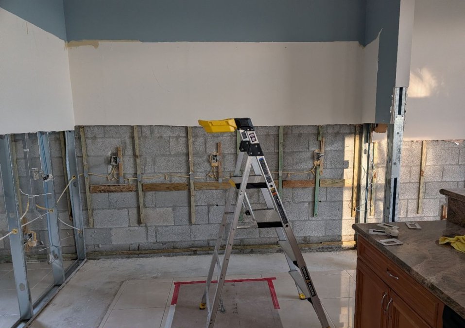 Exposed wall area after removal of affected materials during a residential JLX mold remediation project.