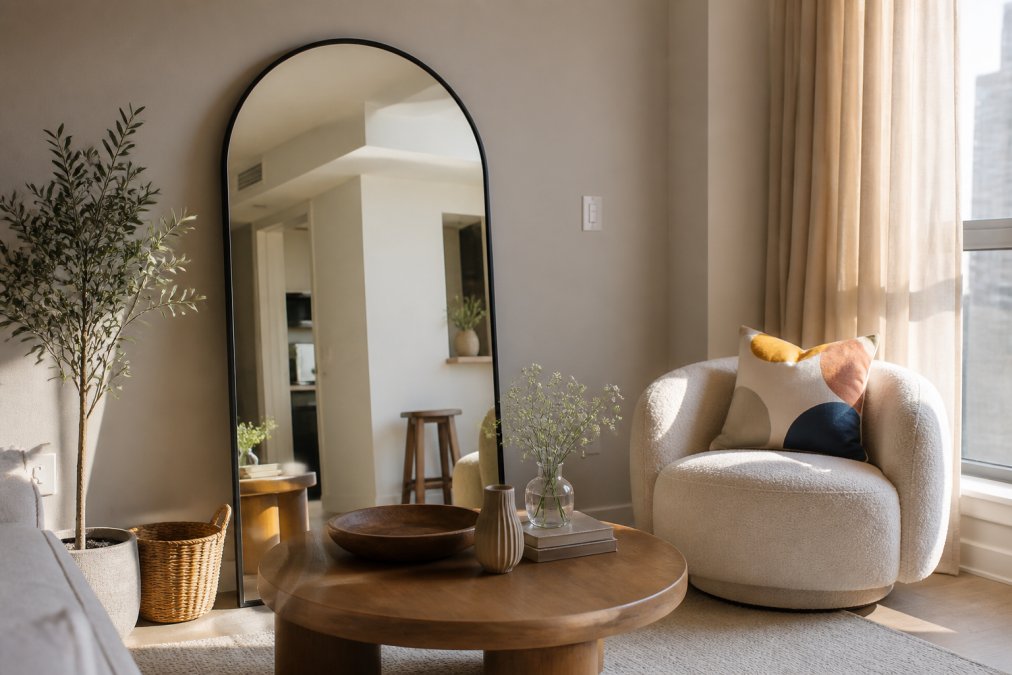 Diagram illustrating home accents layout with arched mirrors, round tables, and curved chairs in a living space
