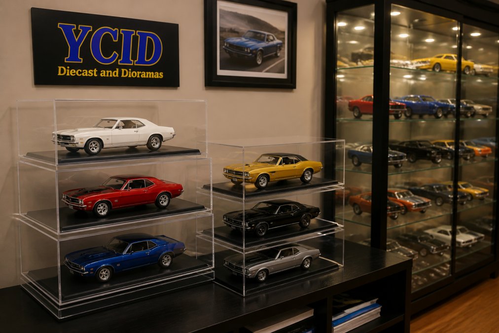 1:18 scale model cars inside clear acrylic cases on a tiered muscle car display shelf
