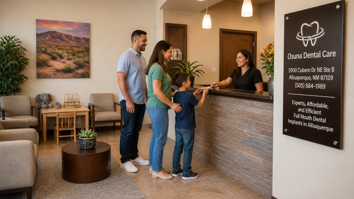 Welcoming dental office reception area with comfortable seating, friendly staff at the front desk, and family-friendly décor with soft lighting and calming colors