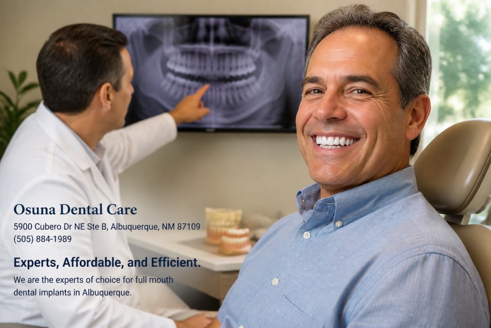 A confident middle-aged man smiling widely, showing a full set of natural-looking teeth, sitting in a bright dental consultation room with a dentist pointing at a 3D jaw scan on a monitor