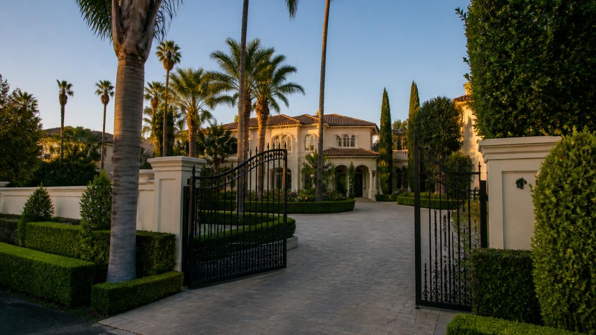 Luxury estate behind a gated driveway in Beverly Hills, a key focus for any luxury agent Beverly Hills seeking listings.