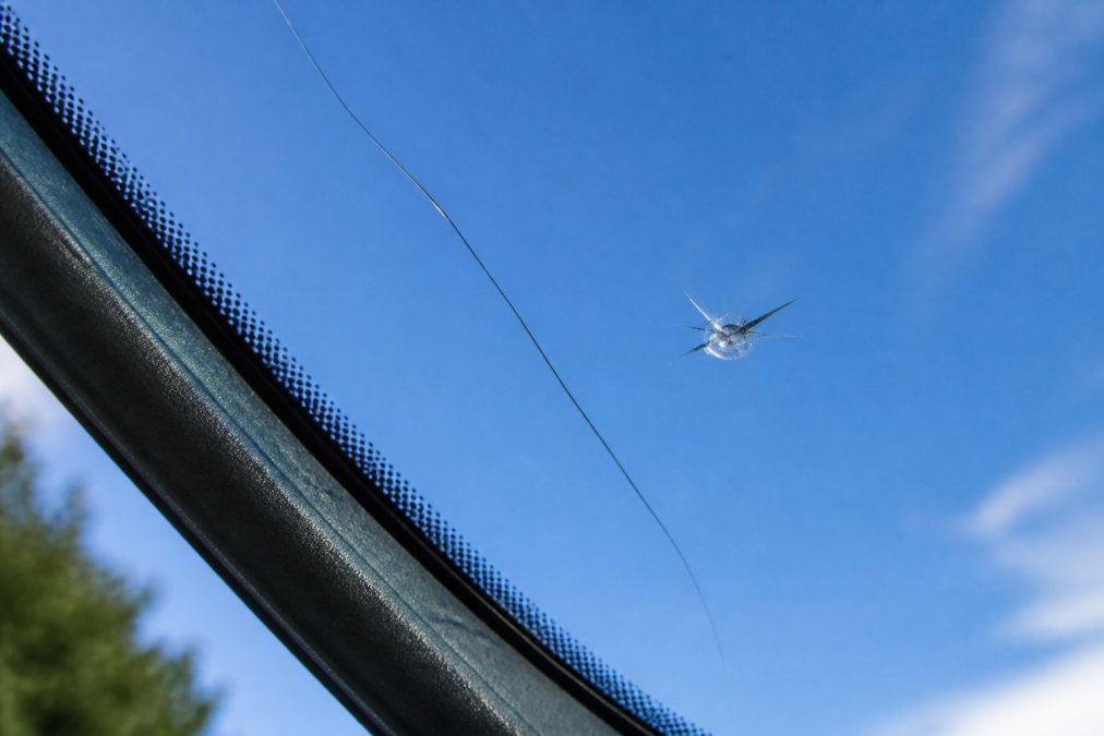 Side-by-side comparison of auto glass warranty coverage