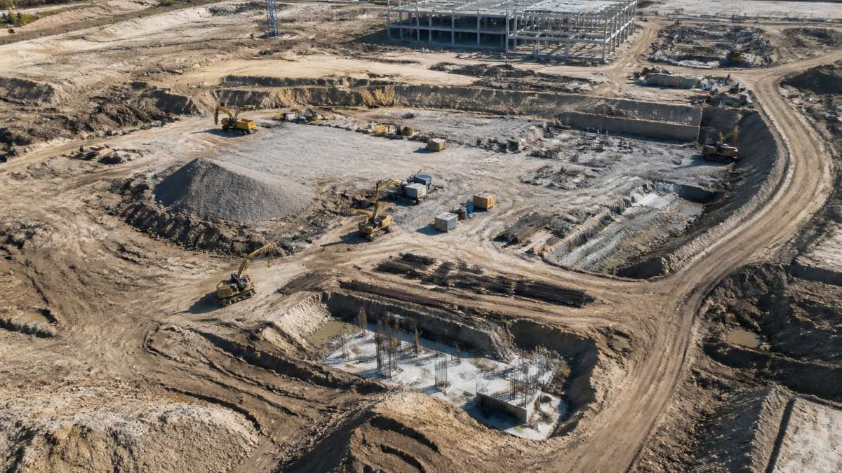 Aerial view of an active construction site showing how the benefits of lidar for site inspection track progress.