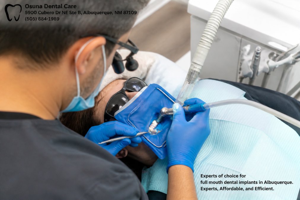 Dentist using specialized tools for replacing old silver fillings with rubber dam isolation in a clinic