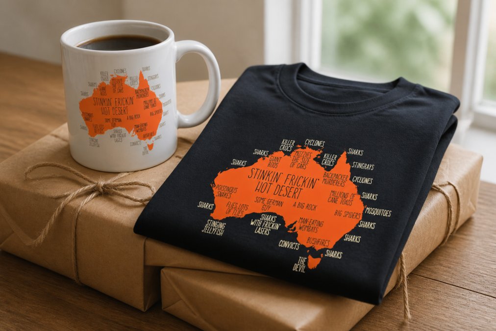 A close-up of a personalised coffee mug and a folded novelty t-shirt sitting on a timber table, gift-wrapped with kraft paper and twine, soft natural light from a nearby window