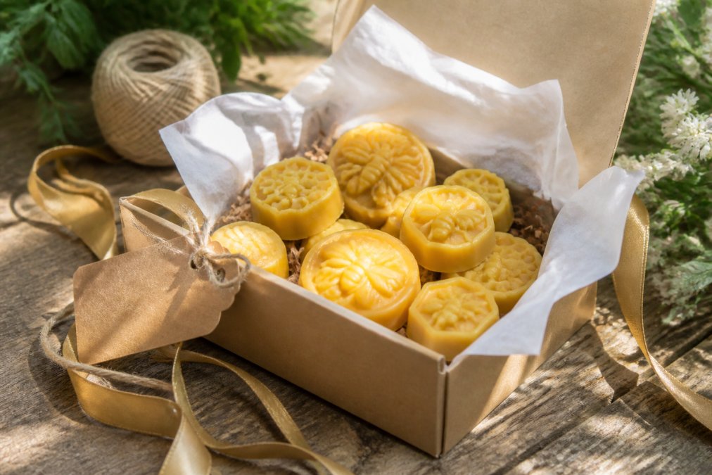 Beeswax melts in a gift box with ribbon and a handwritten tag, perfect as the best beeswax melts for gifts.