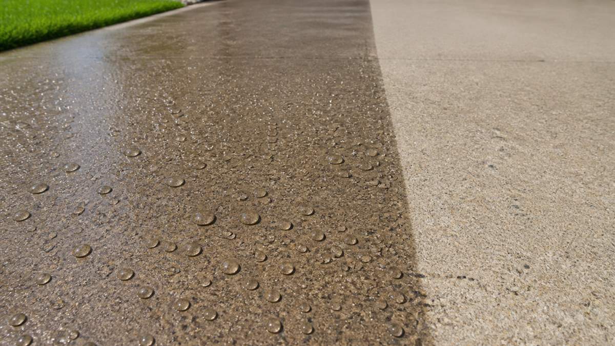 Infographic comparing water beading on sections treated with high-quality concrete driveway sealers versus unsealed areas.