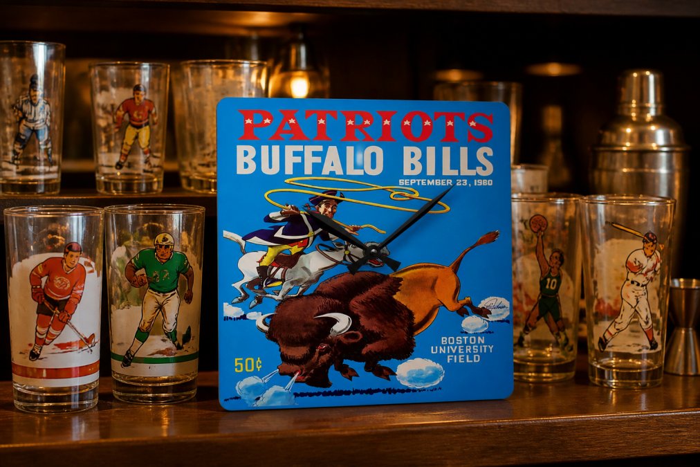 A collection of vintage sports mixing glasses arranged on a home bar shelf displaying different era designs from 1940s-1960s with team logos, warm amber lighting highlighting the vibrant prints and glass clarity