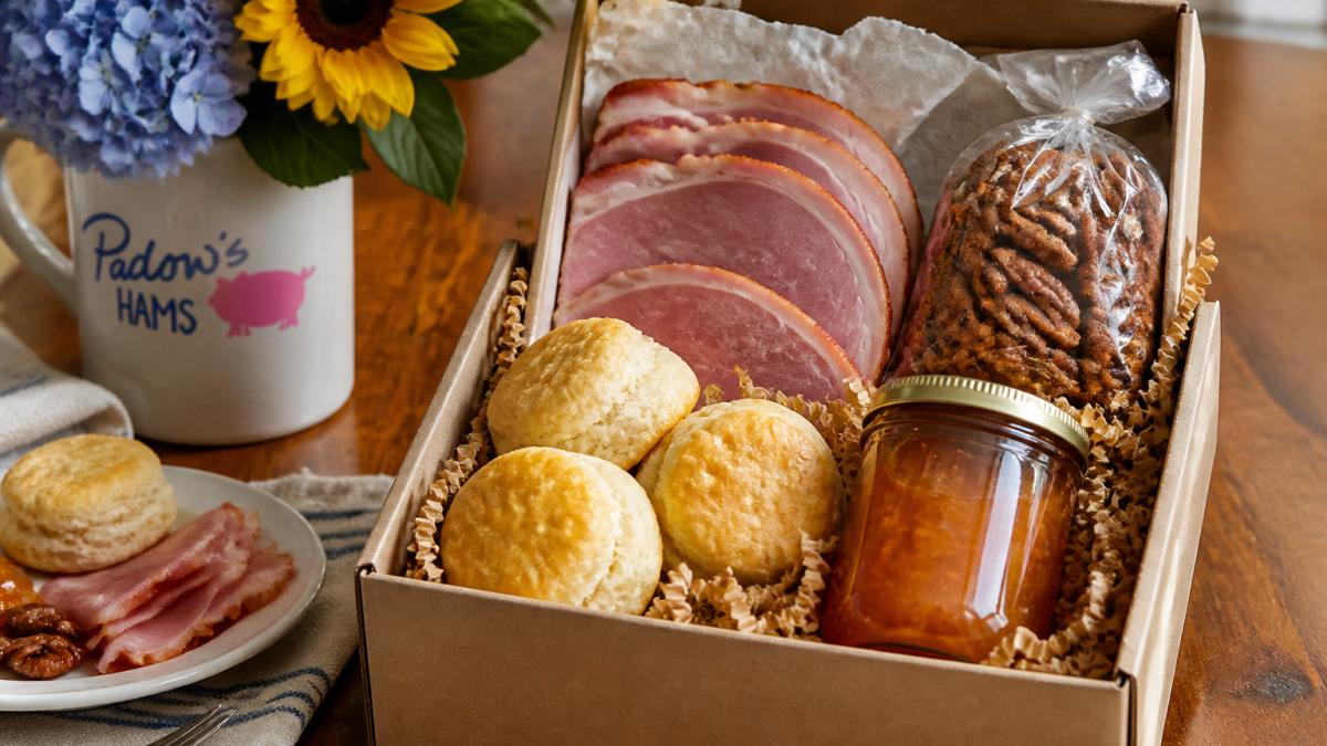 Infographic detailing key components of gourmet southern food gifts like country ham, pecans, and biscuits.