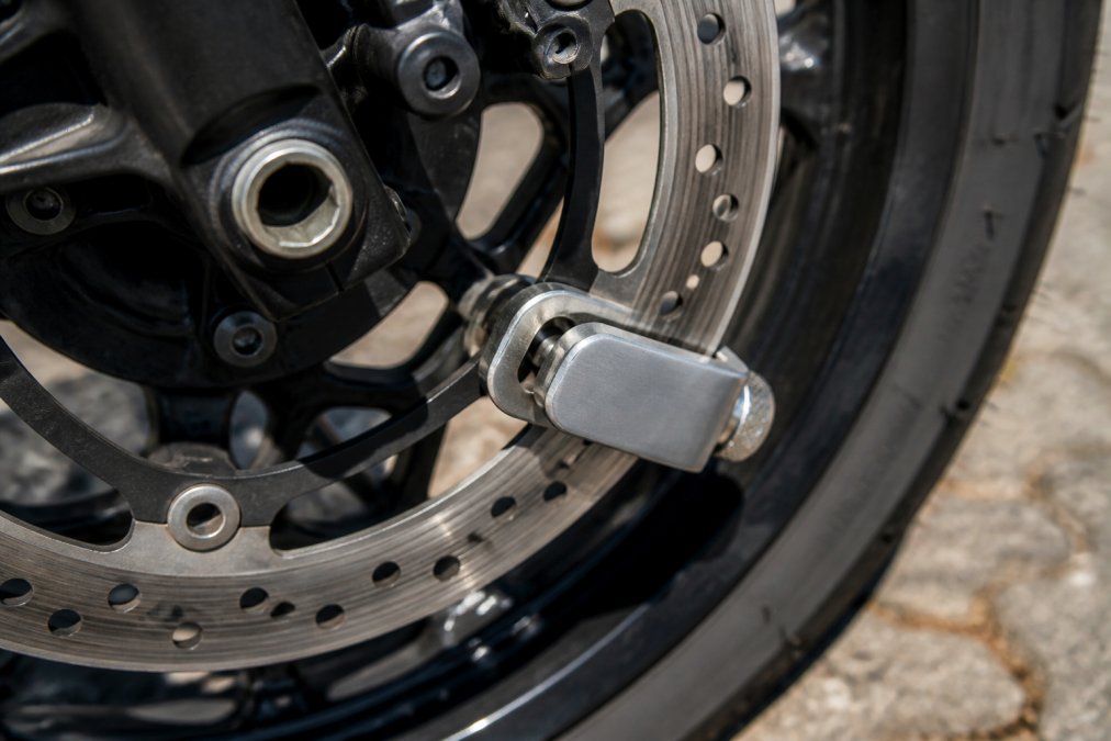Professional illustration showing motorcycle theft deterrent