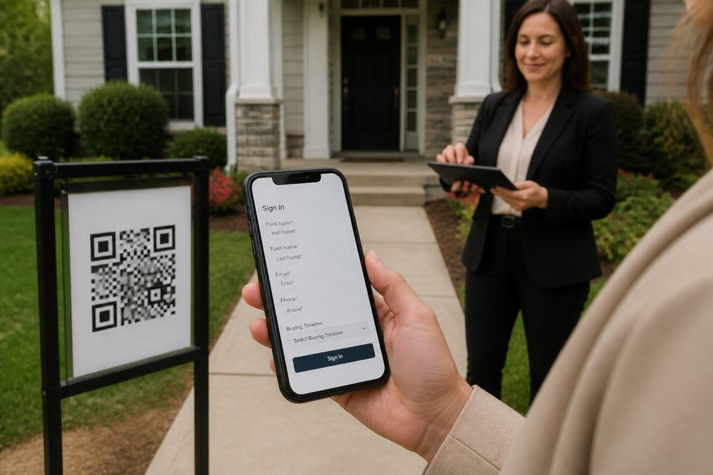 Close-up of a visitor's smartphone displaying a sign-in form with name, email, phone, and buying timeline fields, with a real estate agent in professional attire visible in the background reviewing visitor information