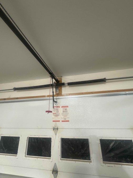 Broken garage door torsion spring