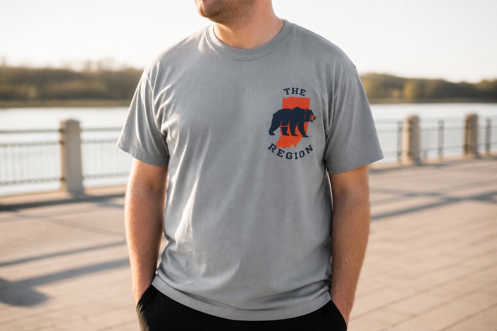 Person wearing Indiana Bears The Region T-shirt outdoors in natural sunlight, showing the garment-dyed fabric texture and relaxed fit detail