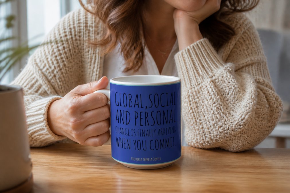 Close-up of an inspirational mug with meaningful quote text visible, held during a reflective morning moment with soft natural lighting