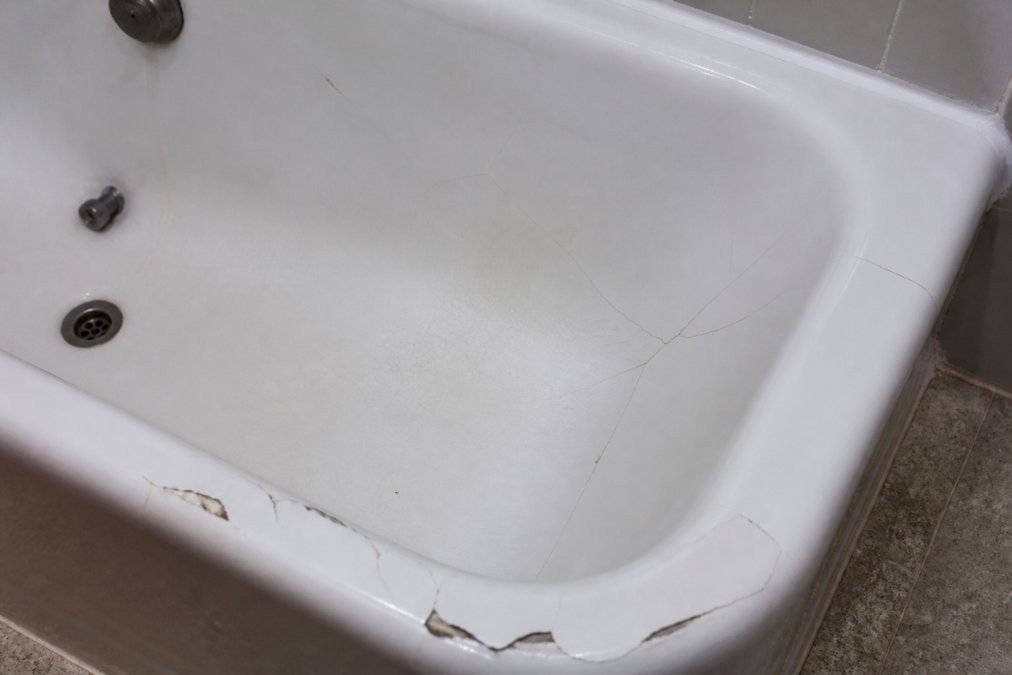 Diagram identifying hairline, stress, and chipped cracks to help you fix cracked fiberglass tubs correctly.