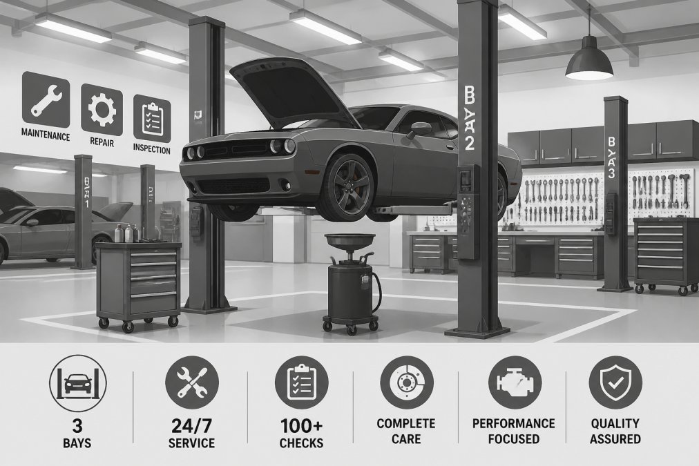 Professional service center interior showing multiple work bays, a Dodge Challenger on a hydraulic lift during routine maintenance, organized tool walls, and bright overhead lighting