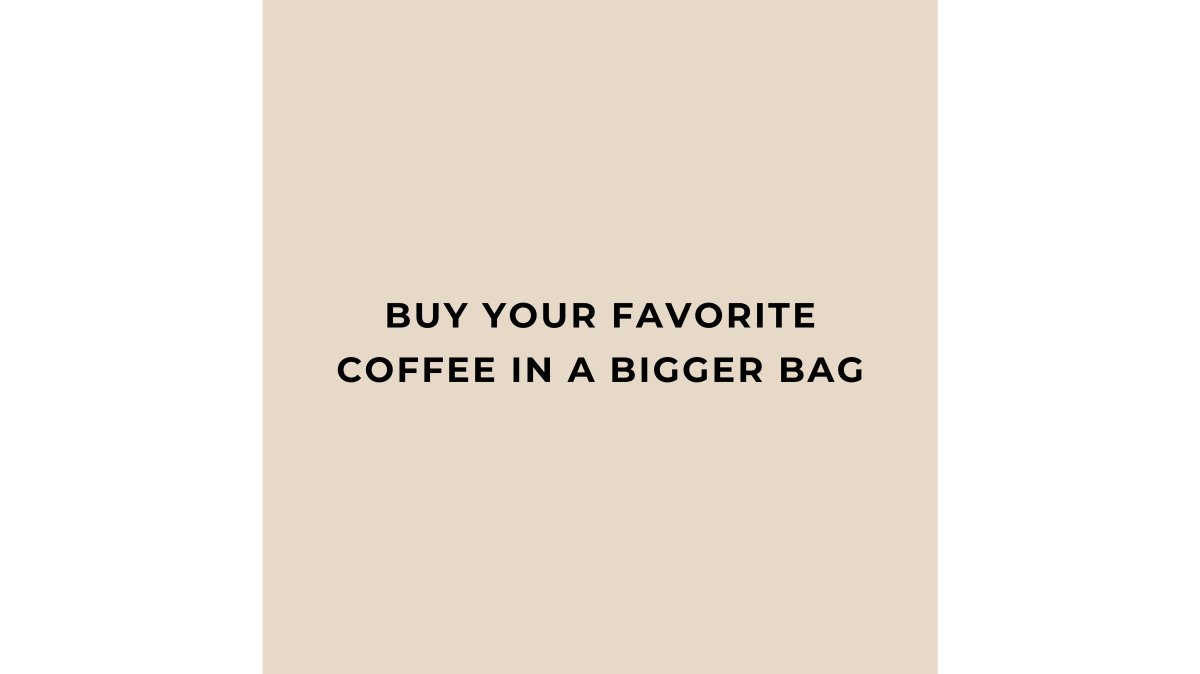 A warm, natural-light photo of several open bags of whole bean coffee on a wooden kitchen counter, with a ceramic pour-over brewer and a freshly brewed cup of coffee nearby, showcasing the beans' varied roast colors