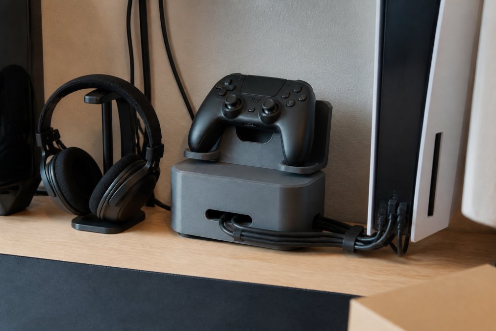 Diagram showing a clean desk setup featuring a durable 3d printed gaming controller stand and cable management.