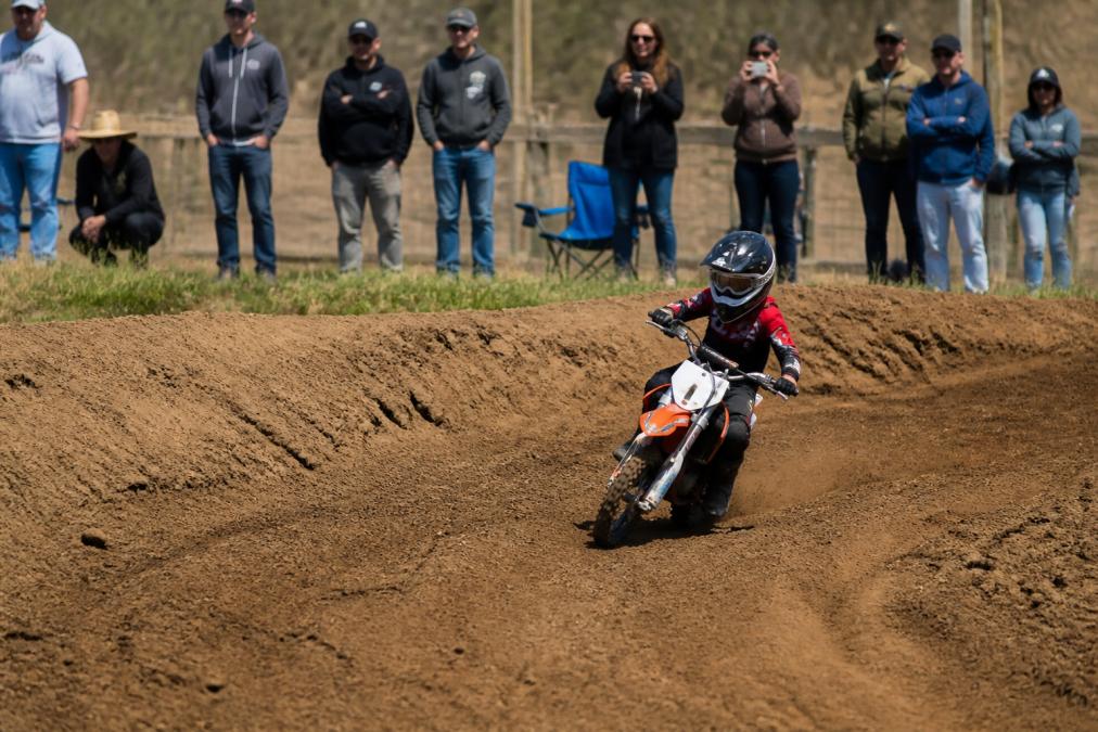 Professional illustration showing young and beginner and rider concepts for beginner motocross tracks