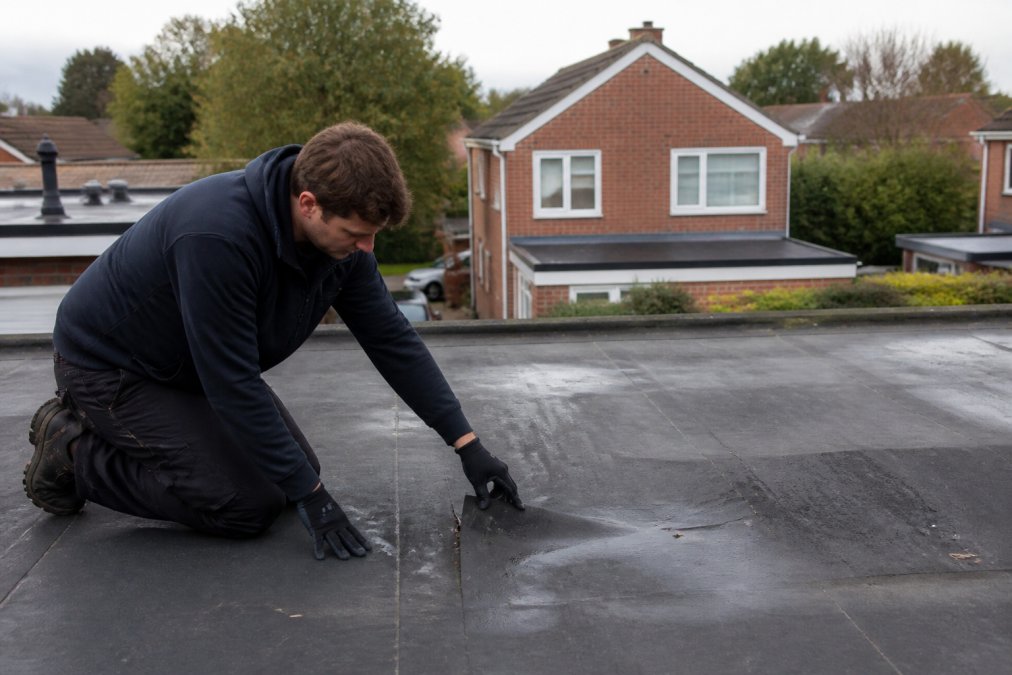 Professional demonstrating flat roof maintenance checklist for homeowners technique in modern clinical setting with natural lighting