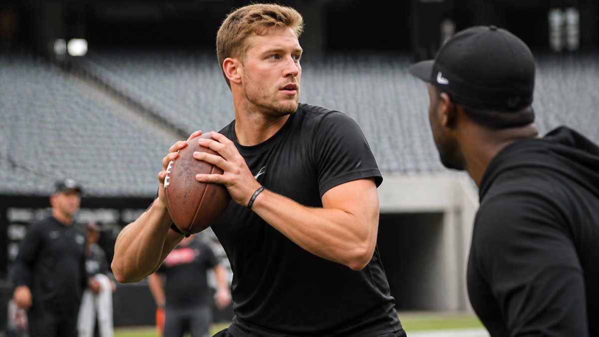 Professional quarterback intensely reading the defense to master quarterback mental preparation drills during practice.
