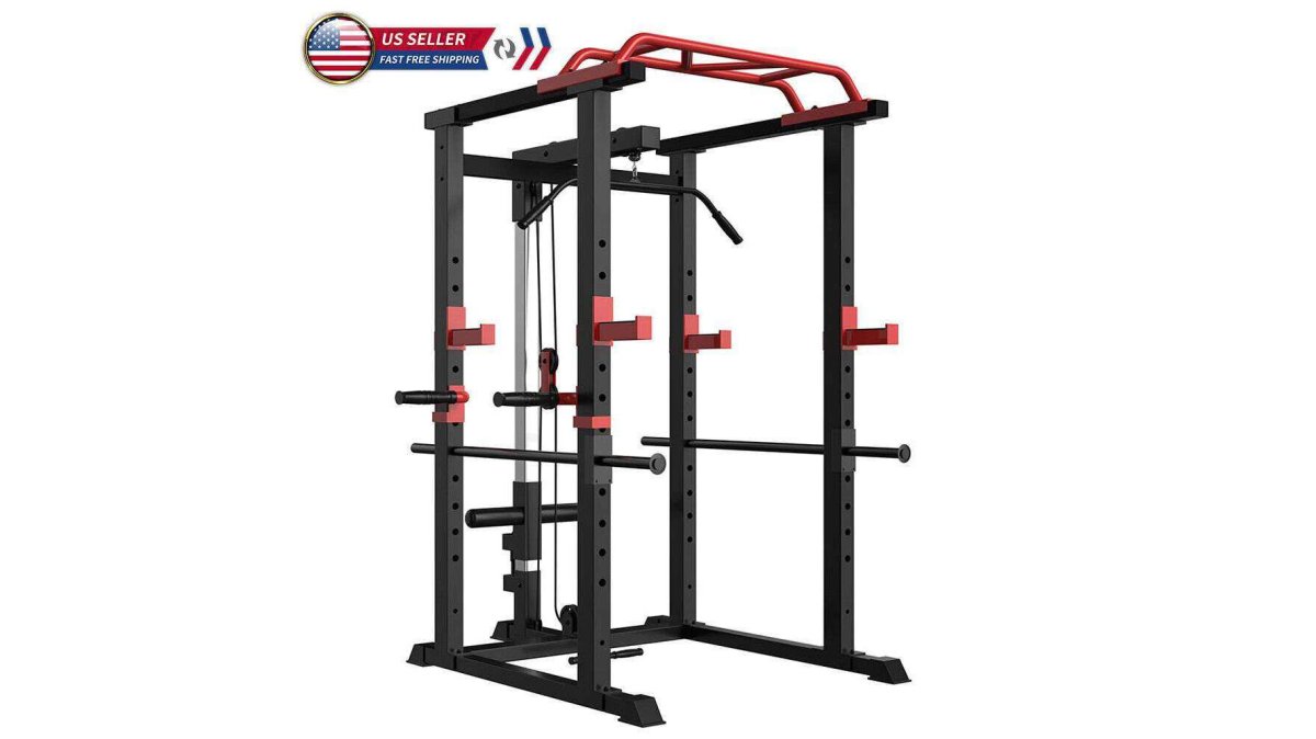 A lifter performing a barbell back squat inside a red power cage in a clean, well-lit home garage gym with rubber flooring