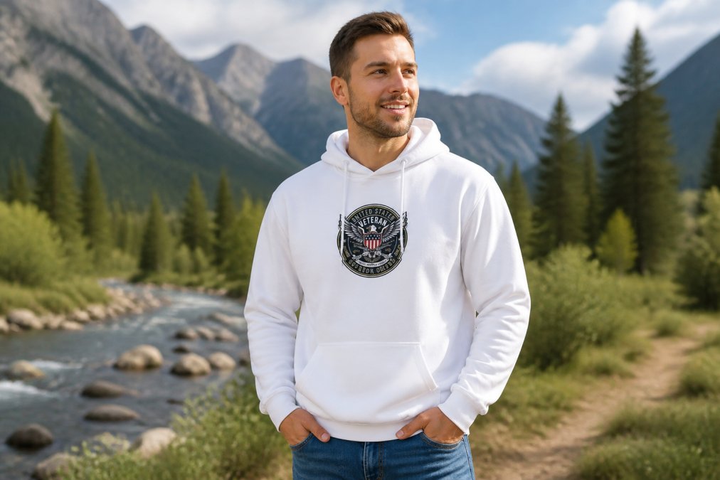 Veteran wearing a heavy-blend patriotic hoodie in outdoor setting, showing fabric texture and fit against natural daylight, with clear visibility of graphic design