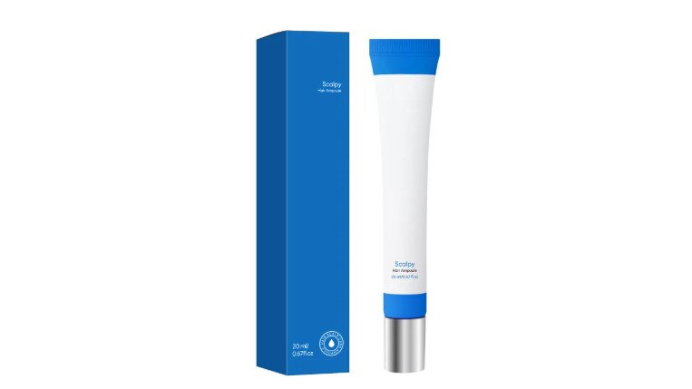 A flat-lay photo of affordable beauty products including a collagen peel-off mask tube, hair growth serum bottle, and jade roller arranged on a white marble counter with soft natural window lighting
