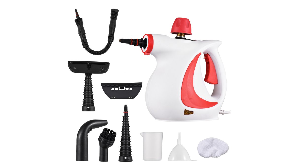 A person using a handheld high-pressure steam cleaner on a kitchen stovetop, visible steam lifting grease from the surface, bright modern kitchen setting