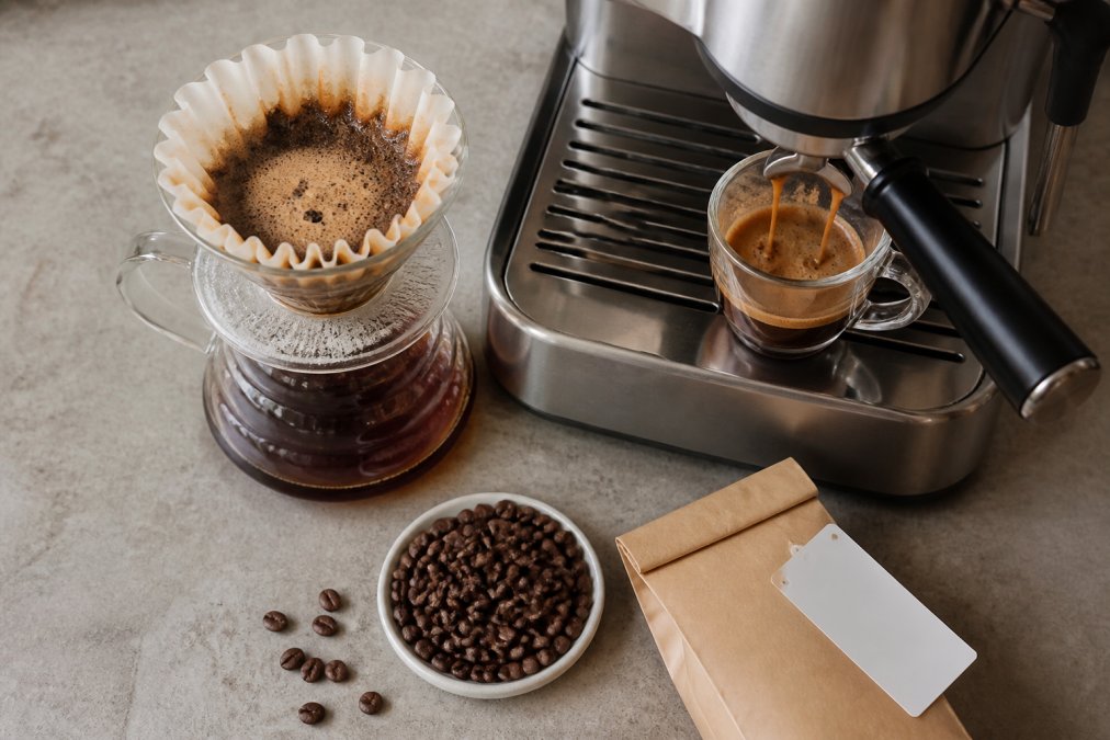 Pour-over coffee blooming and espresso being brewed to show how long after roasting is coffee best for flavor.