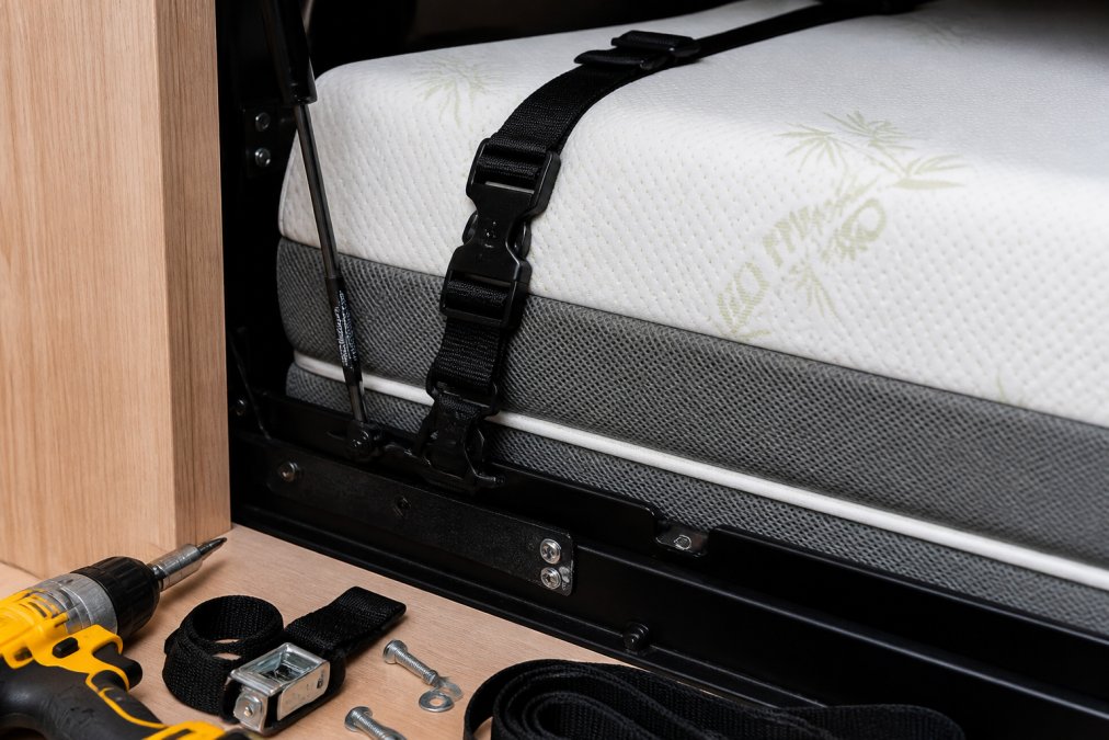 Detail shot of heavy-duty anti-slip straps and safety fasteners securing a mattress firmly to a wall bed frame mechanism