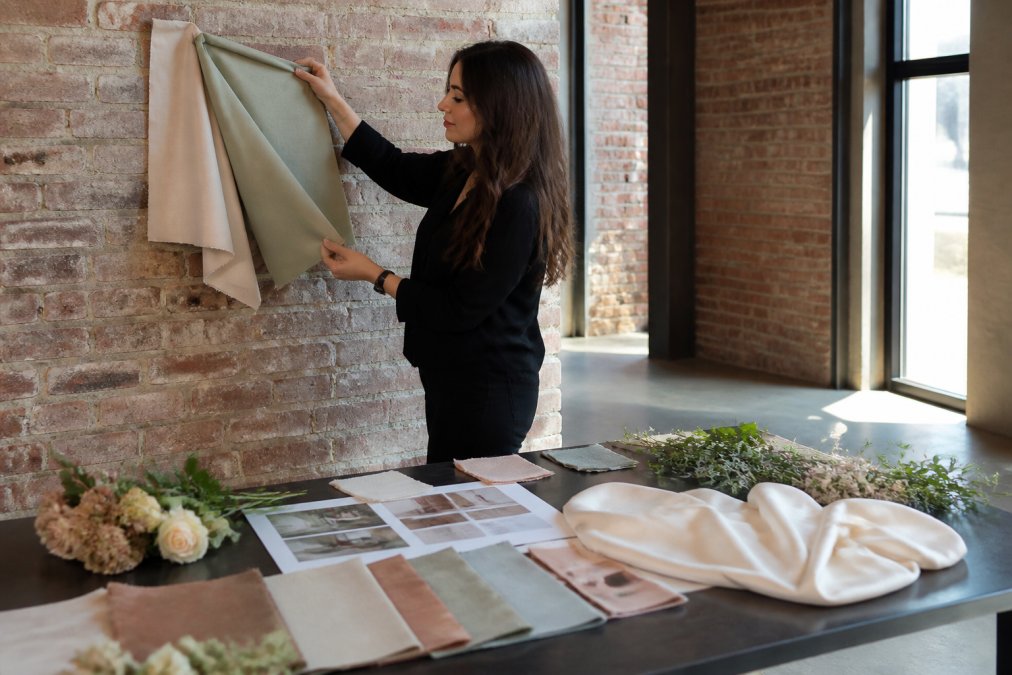 Process infographic showing how to choose event fabric colors by testing swatches against venue decor and florals