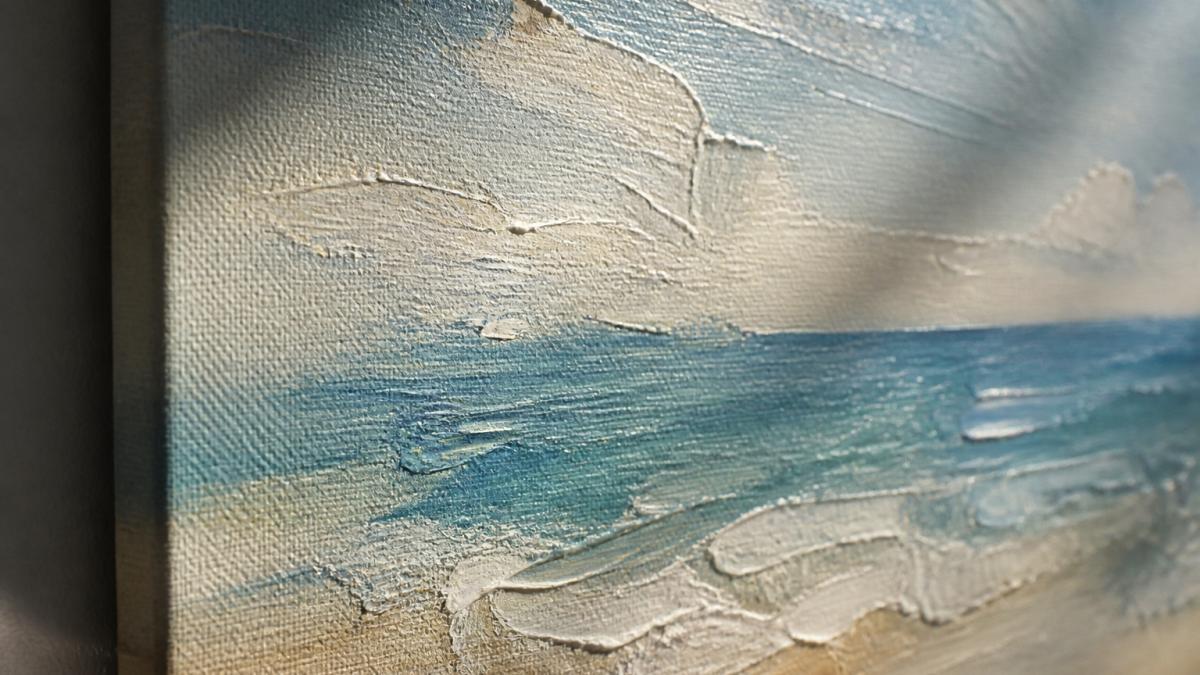 Close-up of a textured canvas print showing visible brushstroke detail and layered paint texture with natural light creating shadows across the surface