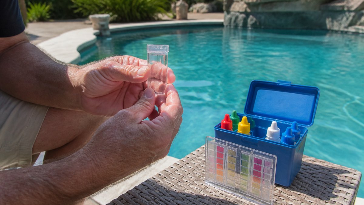 Process diagram showing how to use a pool test kit to diagnose cloudy pool water by comparing results to a chart