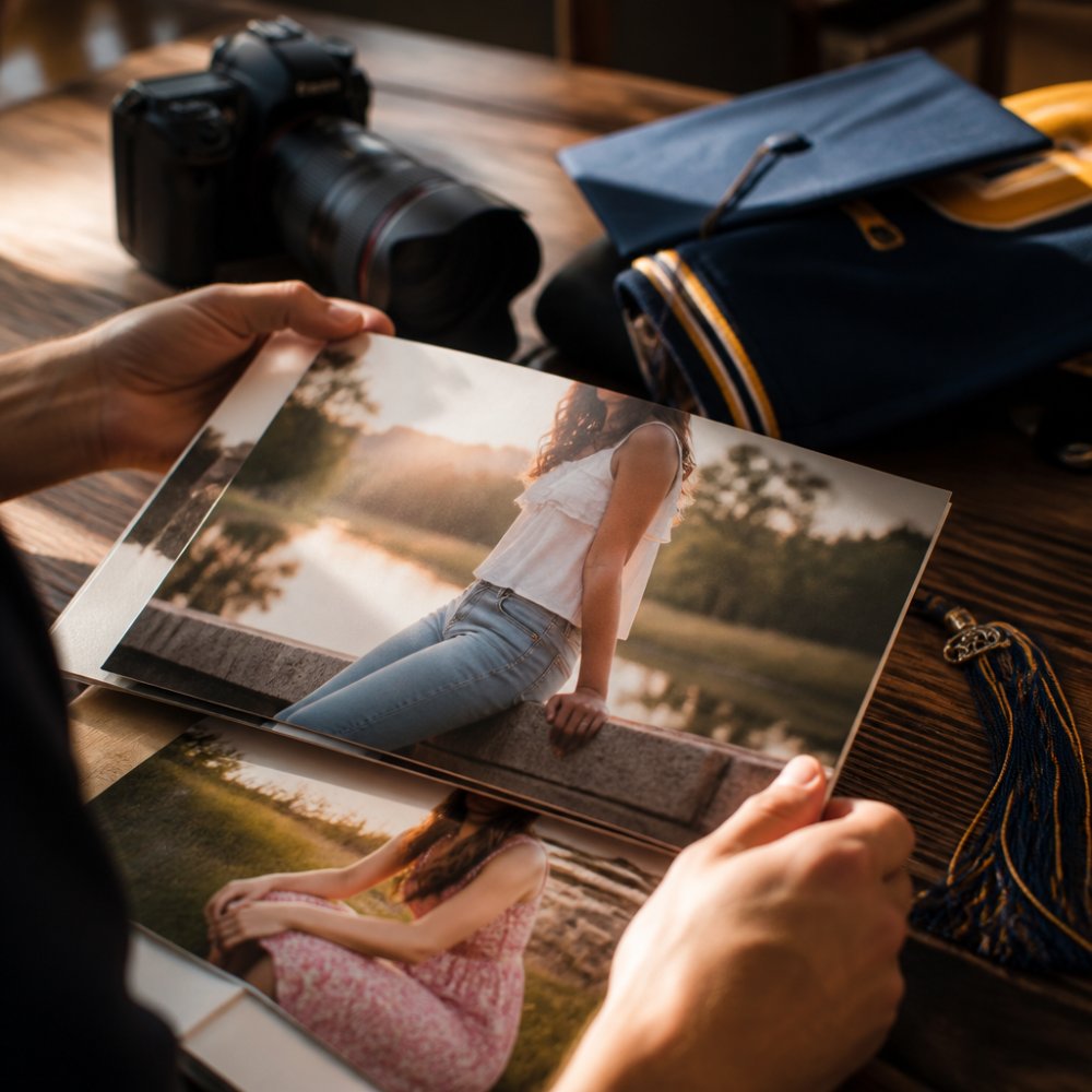 High school senior posed authentically outdoors in natural golden-hour light, wearing a favorite outfit that reflects their personality, genuine expression and relaxed posture