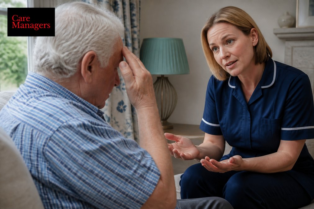 Caregiver maintaining calm body language, speaking gently at eye level with an older person showing signs of agitation in a quiet, softly lit room