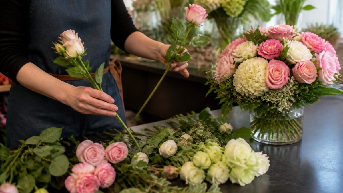 Step-by-step process of a florist substituting stems for online flowers based on the original order photo