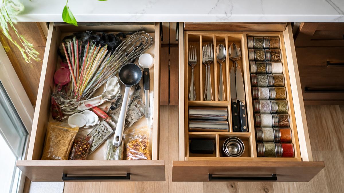Cluttered versus organized small kitchen drawers with cutlery and spice inserts in soft daylight