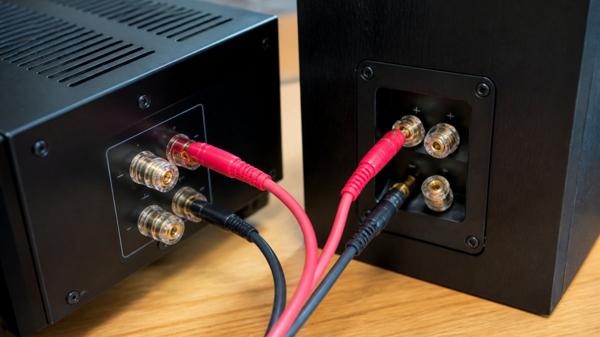 Diagram showing how to pair amplifier with passive speakers by matching red and black cables to terminals.