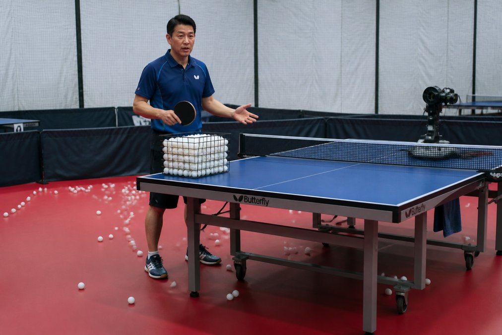 Infographic showing the ideal layout for a multi ball practice setup with a robot feeder and ball collector.