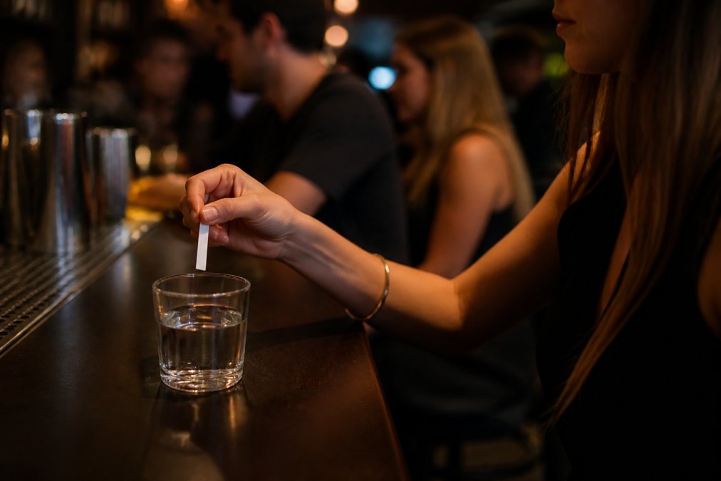 Professional illustration showing Close for drink spiking