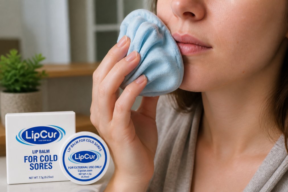 Close-up of a person's lips during early tingling stage with a cold compress being gently applied to the affected area, hands holding a soft cloth-wrapped ice pack in natural lighting