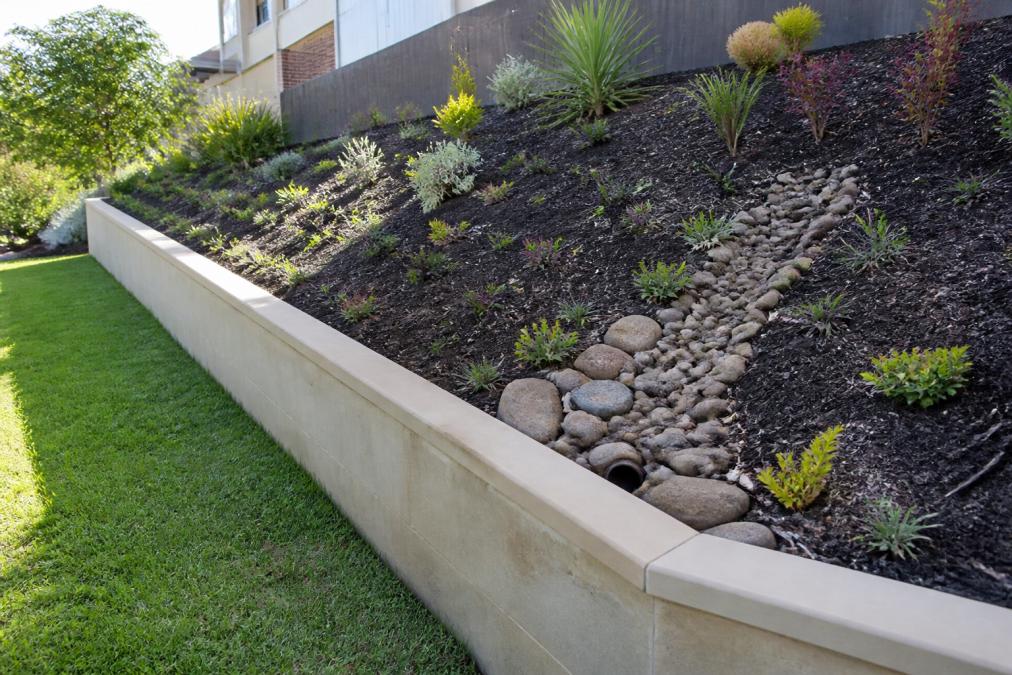 Improve Drainage on Sloped Garden Beds: A Guide