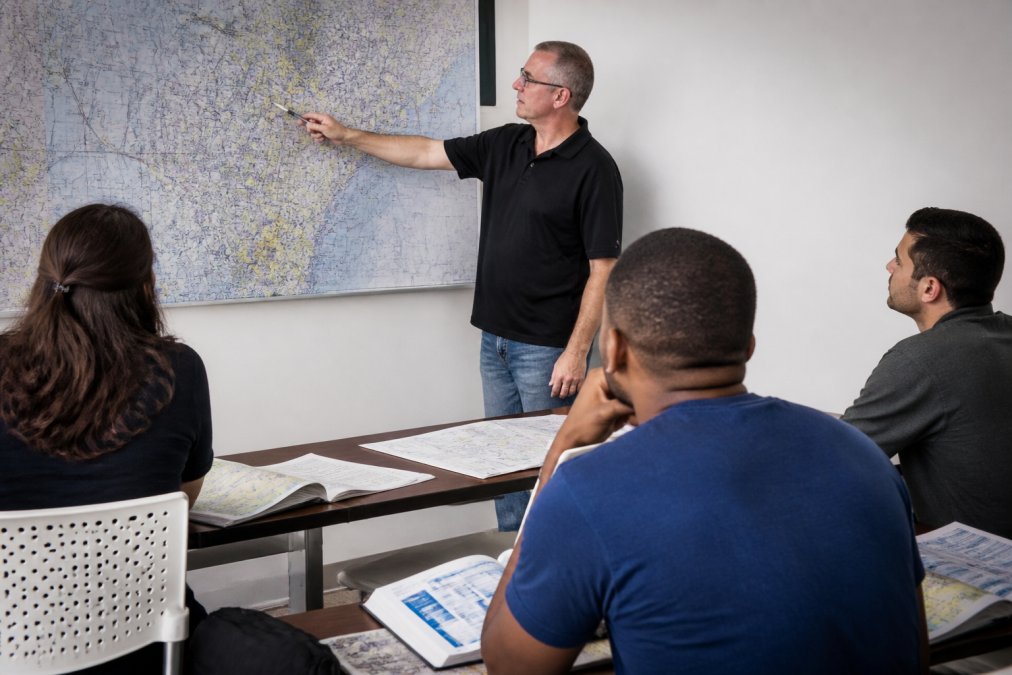 Infographic illustrating the 200-hour dispatcher training curriculum through aviation weather and flight planning.