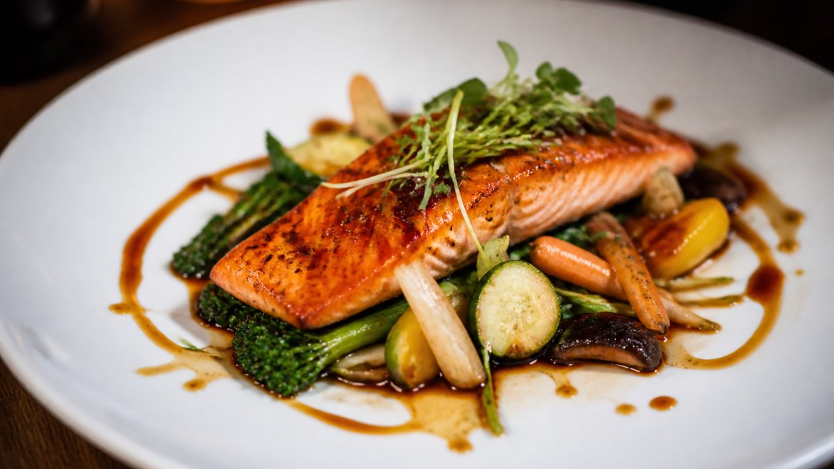 Grilled salmon with ginger glaze and fresh vegetables, a perfect dish if you wonder is asian fusion food too adventurous