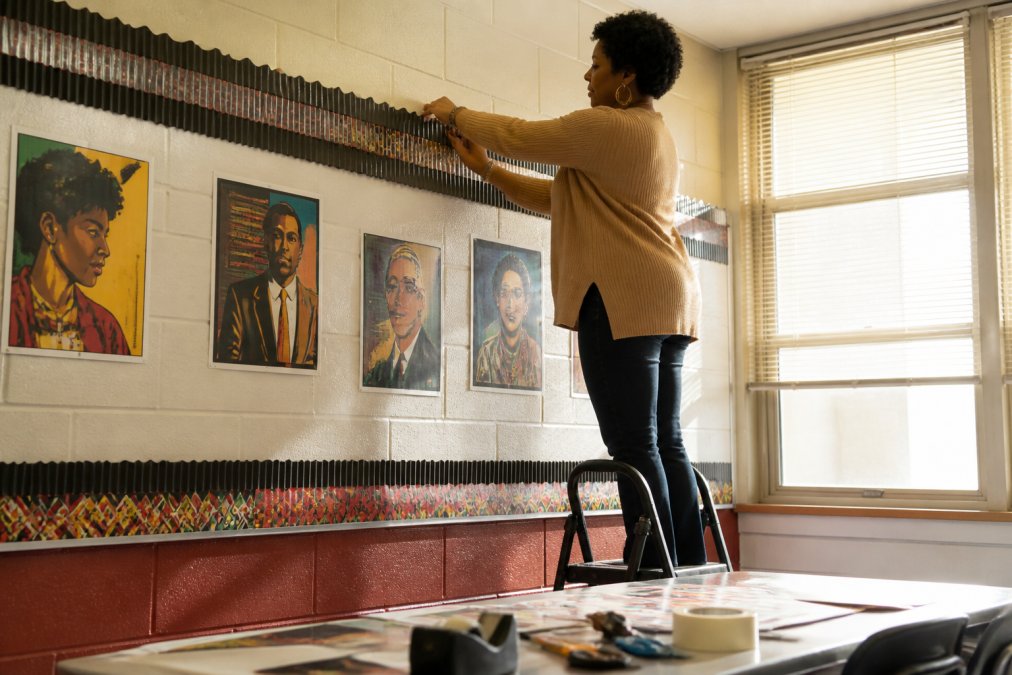 Teacher arranging printable Black History Month 2026 decor on a classroom wall to see if it is worth the time.