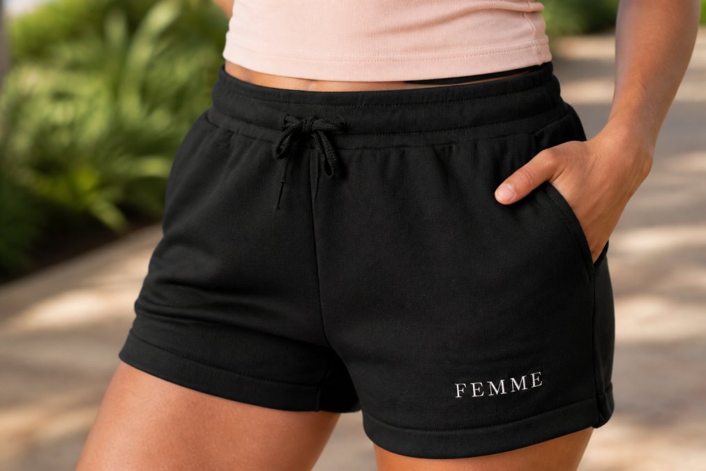 Close-up detail of breathable, lightweight polyester fabric texture showing the smooth weave and natural drape of island-inspired loungewear as it settles gently against the body, demonstrating movement and flow