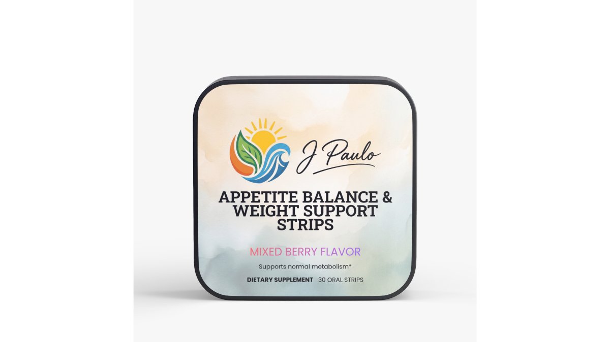A close-up of a hand holding a single white oral strip above the J. Paulo Appetite Balance & Weight Support Strips package, with a clean kitchen counter background softly blurred