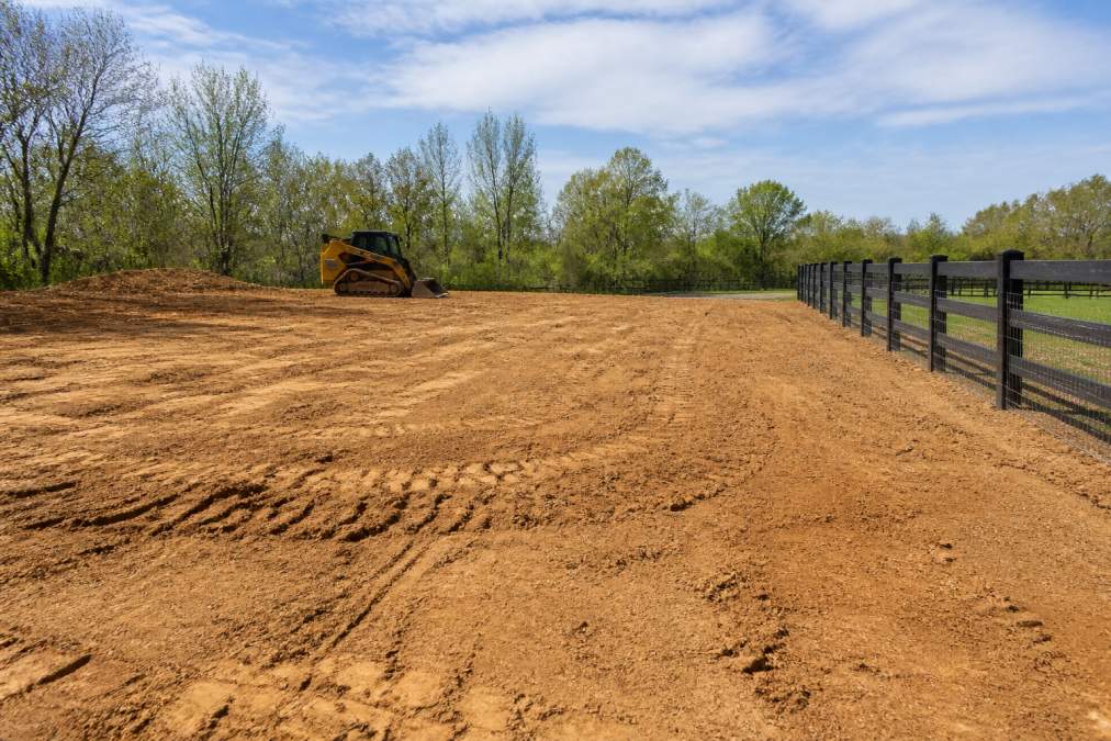 Land Leveling and Fence Installation Together: 2026 Guide